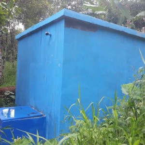 PENAMPUNG: Bak air dari proyek Sistem Penyediaan Air Minum  yang dibangun di Desa Touliang Oki.